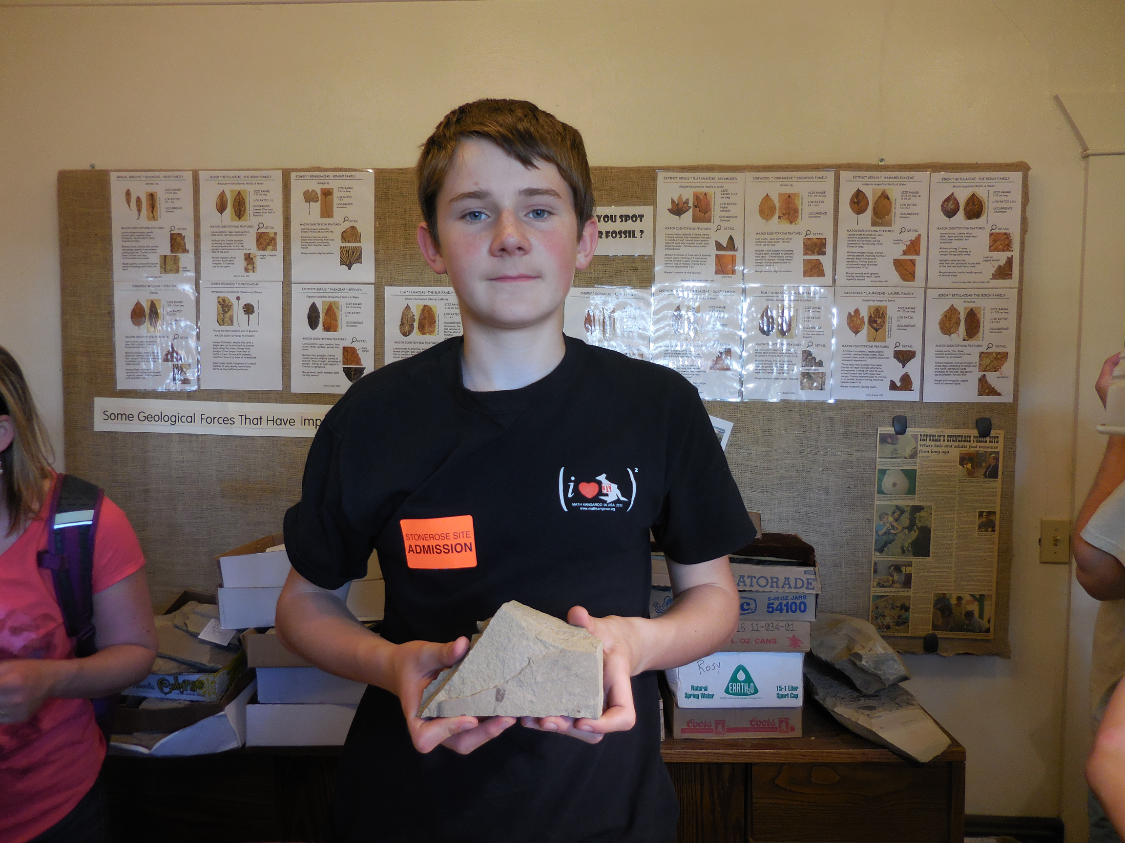 ethan holding fossil of wing_150